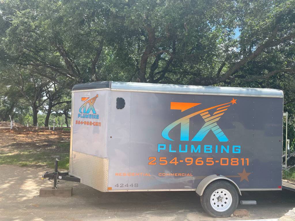 TX Plumbing Service & Repair truck loaded with hydro jetting hose and equipment in Stephenville, TX