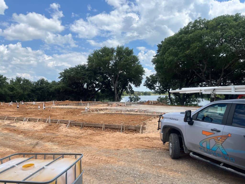 TX Plumbing Service & Repair work truck staged at a jobsite in Stephenville, TX